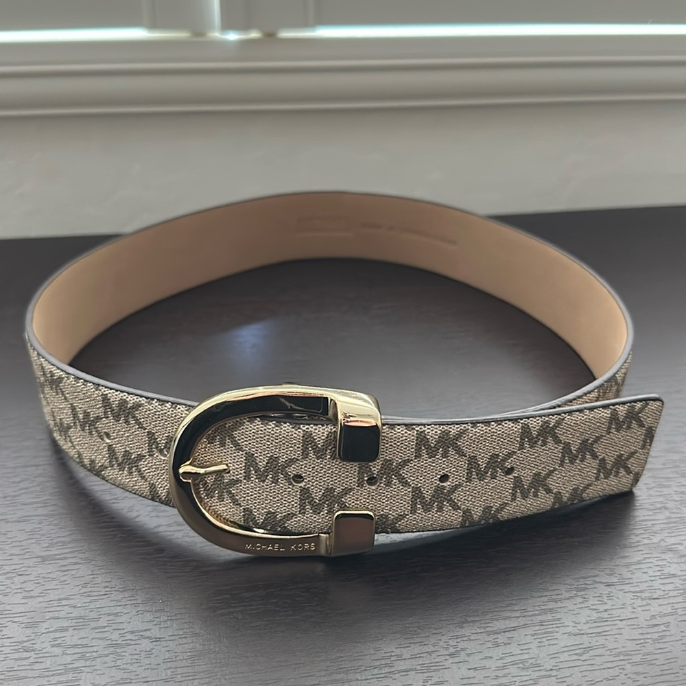 Like new Michael Kors brown / tan logo belt with gold buckle